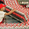 Một dây chuyền sản xuất của Coca-Cola. Ảnh minh họa. (Nguồn: AP)