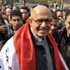 Ông Mohamed El Baradei ham gia vào cuộc biểu tình tại Quảng trường Tahrir ngày 25/11. (Nguồn: AP)