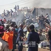 Nhân viên an ninh điều tra tại hiện trường một vụ nổ bom ở Kaduna. Ảnh minh họa. (Nguồn: AFP/TTXVN)