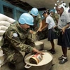 Lực lượng MINUSTAH hỗ trợ tại một trường học ở Lycee de Damia. (Nguồn: canadainternational.gc.ca)