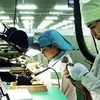 Công nhân làm việc tại một doanh nghiệp Nhật Bản ở Việt Nam. (Nguồn: vccinews.vn)