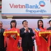 Lãnh đạo cấp cao của Việt Nam và Lào cắt băng khai trương chi nhánh Vietinbank tại Lào. (Ảnh: Minh Thúy)