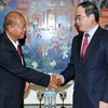 Phó Thủ tướng Nguyễn Thiện Nhân tiếp Tổng Giám đốc Thông tấn xã Lào. (Ảnh: Quốc Khánh/TTXVN)