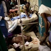 Các nạn nhân vụ đánh bom tại bệnh viện Mulago ở Kampala tối 11/7. (Ảnh: AFP/TTXVN)
