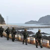 Hải quân Hàn Quốc tuần tra trên đảo Yeonpyeong ngày 17/12. (Ảnh: AFP/TTXVN)