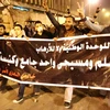 Những người biểu tình tuần hành ở thủ đô Cairo, ngày 28/1. (Ảnh: AFP/TTXVN)