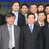 Chủ tịch nước Nguyễn Minh Triết đến thăm và chúc Tết cán bộ, nhân viên Vinaconex. (Ảnh: Nguyễn Khang/TTXVN)