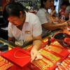 Cửa hàng vàng tại tỉnh An Huy, miền đông Trung Quốc. (Ảnh: AFP/TTXVN)