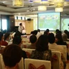 Khách hàng tham dự sự kiện ra mắt một chuỗi biệt thự nghỉ dưỡng của Archi tại Hòa Bình. (Ảnh: Vietnam+)