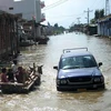 Ngập lụt tại quận Badin ngày 20/9. (Ảnh: AFP/TTXVN)
