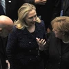 Thủ tướng Đức Angela Merkel cùng Ngoại trưởng Mỹ Hillary Clinton và Tổng thống Afghanitstan tại hội nghị. (Ảnh: Getty)