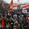 Khoảng 25.000 người đã míttinh rầm rộ ủng hộ UR và bộ đôi Medvedev-Putin. (Ảnh: AP)