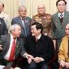 Chủ tịch nước Trương Tấn Sang đến dự cuộc gặp mặt các thế hệ Thiếu sinh quân Việt Nam. (Ảnh: Nguyễn Khang/TTXVN)