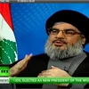 Cuộc phỏng vấn giữa Assange với Nasrallah đã thực hiện qua videolink. (Nguồn: ibtimes.com) 