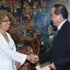 Phó Thủ tướng tiếp Ban vận động trách nhiệm và cứu trợ da cam Việt Nam do bà Susan Schnall làm trưởng đoàn. (Ảnh: Phương Hoa/TTXVN)