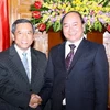 Phó Thủ tướng Nguyễn Xuân Phúc tiếp ông Boviengkham Vongdara. (Ảnh: Phương Hoa/TTXVN)