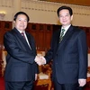 Thủ tướng Nguyễn Tấn Dũng tiếp Bộ trưởng Bộ Tư pháp Lào Chalơn Nhiapaohơ. (Ảnh: Đức Tám/TTXVN)