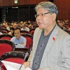 Đại biểu Quốc hội tỉnh Quảng Bình, Bộ trưởng Bộ Tư pháp Hà Hùng Cường phát biểu ý kiến. (Ảnh: An Đăng/TTXVN)