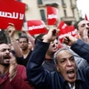 Tối 4/12, hàng trăm nghìn người xuống đường biểu tình tại Quảng trường Tahrir và bên ngoài dinh tổng thống ở khu Heliopolis của thủ đô Cairo. (Nguồn: AFP/TTXVN)