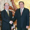 Chủ tịch Quốc hội Nguyễn Sinh Hùng với Tổng Bí thư, Chủ tịch Chummaly Sayasone. (Ảnh: Nhan Sáng/TTXVN)