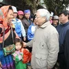 Tổng Bí thư Nguyễn Phú Trọng thăm hỏi nhân dân xã Bản Lầu, huyện Mường Khương. (Ảnh: Trí Dũng/TTXVN)