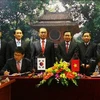 Lễ ký Kế hoạch hợp tác 2013 thực hiện Biên bản ghi nhớ hợp tác về tài chính giữa Bộ Tài chính Việt Nam với Bộ Tài chính và Chiến lược Hàn Quốc, giai đoạn 2013-2015. (Ảnh: Phạm Hậu/TTXVN)