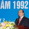 Phó Thủ tướng Nguyễn Xuân Phúc phát biểu tại hội thảo. (Ảnh: Nguyễn Dân/TTXVN)