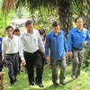Đoàn thanh niên hai nước Việt-Lào thăm Khu di tích lịch sử đặc biệt của Cách mạng Lào tại Tuyên Quang. (Ảnh: TTXVN)