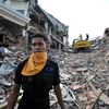 Cảnh đổ nát sau trận động đất ở Padang, Indonesia. (Ảnh: AFP/TTXVN) 