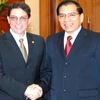Tổng Bí thư Nông Đức Mạnh tiếp Bộ trưởng Ngoại giao Cộng hòa Cuba, Bruno Rodriguez Parrilla. (Ảnh: Nhan Sáng/TTXVN) 