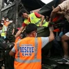 Công tác cứu hộ tại hiện trường vụ tai nạn máy bay. (Ảnh: Getty Images)