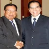 Tổng Bí thư Nông Đức Mạnh tiếp Phó Chủ tịch nước Cộng hoà Dân chủ Nhân dân Lào Bounnhang Vorachith. (Ảnh: Đinh Xuân Tuân/TTXVN)