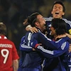 Các cầu thủ Nhật Bản vui mừng sau khi xuất sắc vượt qua vòng bảng. (Nguồn: Getty Images)