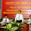 Chủ tịch nước Nguyễn Minh Triết thăm và làm việc với Học viện Tư pháp. (Ảnh: Nguyễn Khang/TTXVN) 