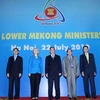 Bộ trưởng Ngoại giao Hoa Kỳ Hillary Clinton và các Bộ trưởng Ngoại giao các nước Tiểu vùng Mekong chụp ảnh chung. (Ảnh: Nhan Sáng/TTXVN)