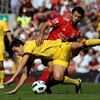 Liverpool (áo đỏ) chấp nhận để đội khách Arsenal (áo vàng) ra về với 1 điểm. (Nguồn: Getty Images)