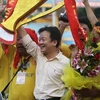 Chủ tịch Đỗ Quang Hiển ăn mừng chức vô địch V-League 2010 của Hà Nội.T&T. (Nguồn: TT&VH)