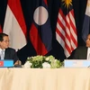 Chủ tịch nước Nguyễn Minh Triết và Tổng thống Hoa Kỳ Obama đồng chủ trì Hội nghị cấp cao ASEAN-Hoa Kỳ lần thứ 2. (Ảnh: Nguyễn Khang/TTXVN)