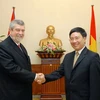 Thứ trưởng Bộ Ngoại giao Phạm Bình Minh tiếp Thứ trưởng Bộ Ngoại giao Cuba, Marcos Rodriguez Costa. (Ảnh: Doãn Tấn/TTXVN)