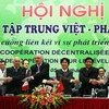 Khung cảnh lễ ký kết thỏa thuận hợp tác về khoa học công nghệ giữa các địa phương Việt Nam và Pháp. (Ảnh: Văn Đức/TTXVN)