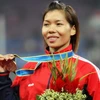 Vận động viên Vũ Thị Hương đã mang về cho điền kinh Việt Nam thêm 1 huy chương bạc. (Ảnh: Quốc Khánh/TTXVN)