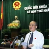 Chủ tịch Quốc hội Nguyễn Sinh Hùng trình bày Tờ trình về danh sách nhân sự Hội đồng dân tộc và các ủy ban của Quốc hội. (Ảnh: Nhan Sáng/TTXVN)