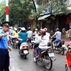 Phân làn giao thông trên tuyến phố Huế-Hàng Bài, Hà Nội. (Ảnh: Thế Duyệt/TTXVN) 