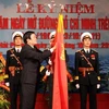 Chủ tịch nước Trương Tấn Sang trao Huân chương Hồ Chí Minh cho cán bộ, chiến sỹ Đường Hồ Chí Minh trên biển. (Ảnh: Trọng Đức/TTXVN)