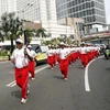 Rước đuốc SEA Games 26 trên đường phố Jakarta. (Nguồn: Reuters)