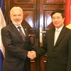 Bộ trưởng Ngoại giao Phạm Bình Minh đón Bộ trưởng Ngoại giao Nicaragua Samuel Santos. (Ảnh: Thống Nhất/TTXVN)