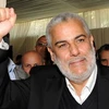 Chủ tịch PJD Abdelilah Benkirane biểu thị niềm vui chiến thắng khi kết quả sơ bộ bầu cử quốc hội Morocco được công bố. (Nguồn: Getty Images)