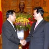 Thủ tướng Nguyễn Tấn Dũng tiếp Bộ trưởng Bộ Tài chính Lào Phouphet Khamphounvong. (Ảnh: Đức Tám/TTXVN)