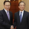 Tổng thống Hàn Quốc Lee Myung Pak gặp Thủ tướng Trung Quốc Ôn Gia Bảo. (Nguồn: Xinhua)
