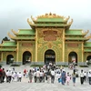 Khách du lịch tới tham quan Khu du lịch Đại Nam Văn Hiến (Bình Dương). (Nguồn: Internet)